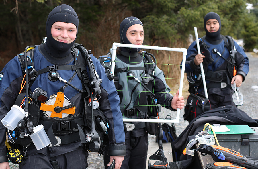 While at the University of Alaska Southeast, Walloch, center, learned basic dive skills. He plans to return to Alaska in January to be a teaching assistant helping others learn to dive.