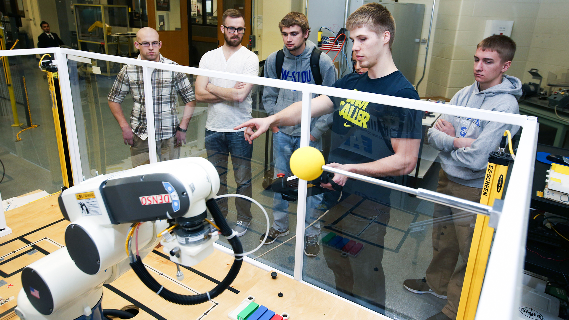 Student watch demonstration in the robotics lab at UW-Stout