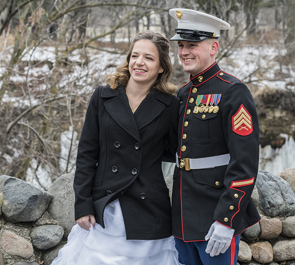 Brandy and Brent Coulthart, at their wedding reception in Minneapolis, met as helicopter mechanics in the Marine Corps. She is a UW-River Falls student. They have two children with a third on the way.