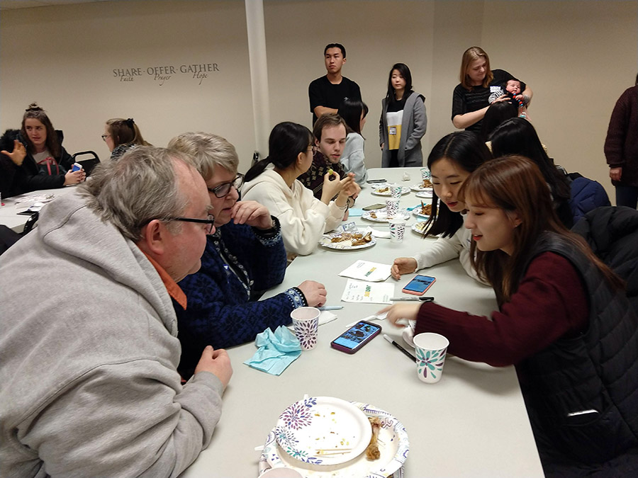 ​ One of the students’ favorite parts of their trip was meeting Menomonie community members during a potluck.   ​