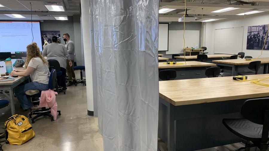 A movable curtain divides space in the new Makers Laboratory, with an engineering and technology lab on the right.
