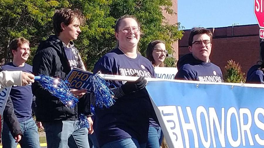 Bailey Pedersen, center, who helped start the Neurodiversity Club at UW-Stout, takes part in an Honors College event.