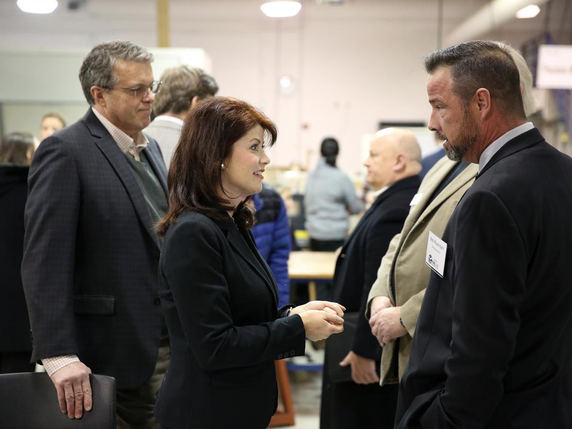​  Bob Rosendahl of Menomonie speaks with Lt. Gov. Rebecca Kleefisch and Discovery Center Executive Director Randy Hulke, left, at the UW-Stout Fab Lab after an announcement that the university would receive $50,000 as part of the Wisconsin Economic Development Council Entrepreneurship Support Program. / UW-Stout photo by Brett Roseman ​