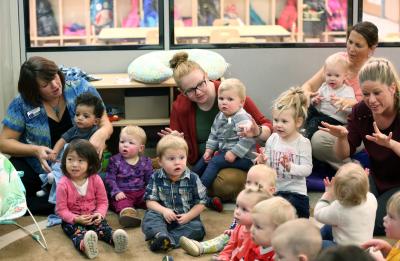 Chancellor Bob Meyer reads to children at the Child and Family Study Center's Infant/Toddler Lab in Heritage Hall Wednesday, November 15, 2017. (UW-Stout photo by Brett T. Roseman)