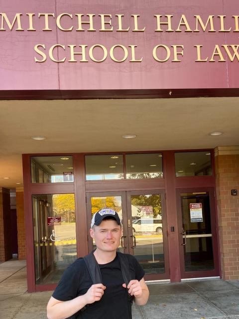 UW-Stout alum Ben Stoflet leaves a building at Mitchell Hamline School of Law in St. Paul, where he is a second-year law student.